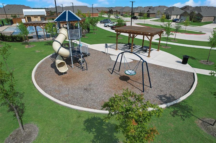 View of property's community featuring a playground