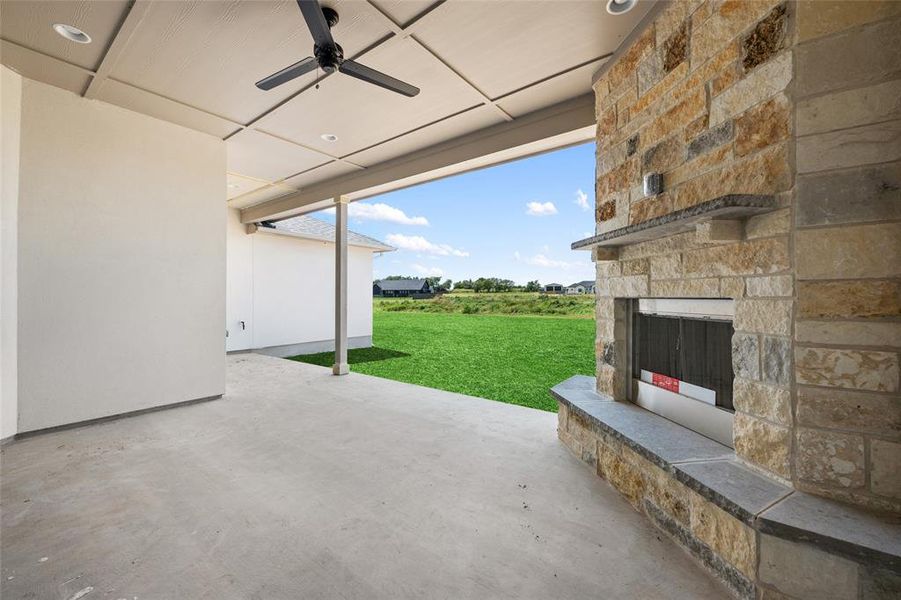 Outdoor patio and fireplace