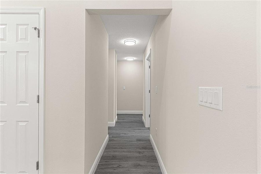 HALLWAY FROM KITCHEN TO BEDROOMS