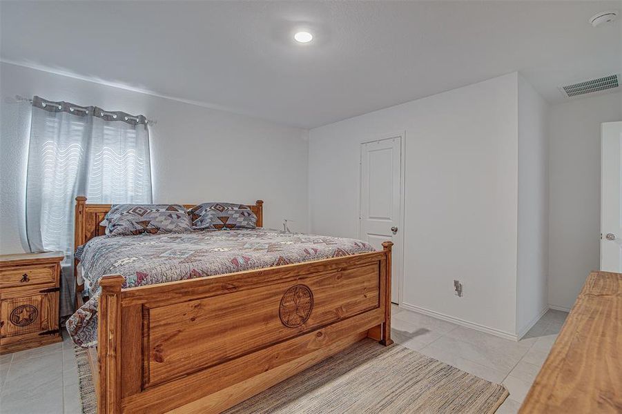 View of tiled bedroom