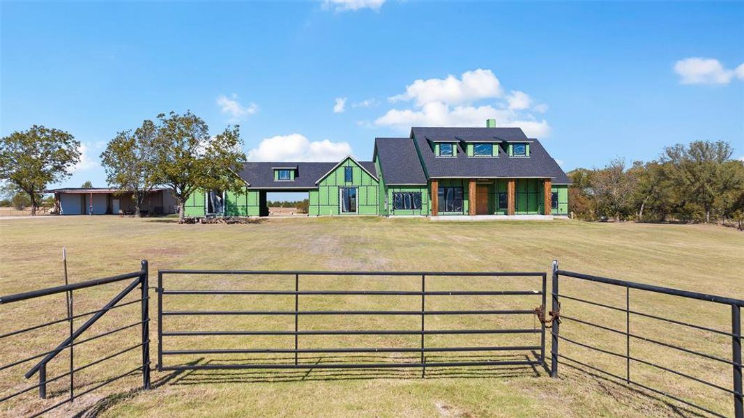 View of front of home with a front lawn