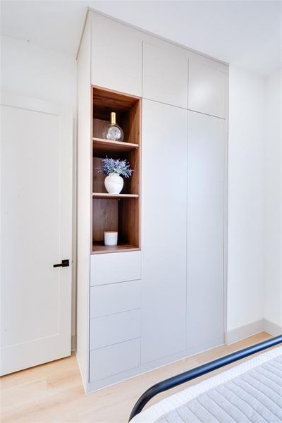 Unfurnished bedroom with light wood-type flooring