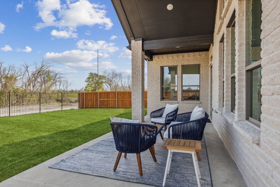 Covered Patio in the Van Gogh II home plan by Trophy Signature Homes – REPRESENTATIVE PHOTO