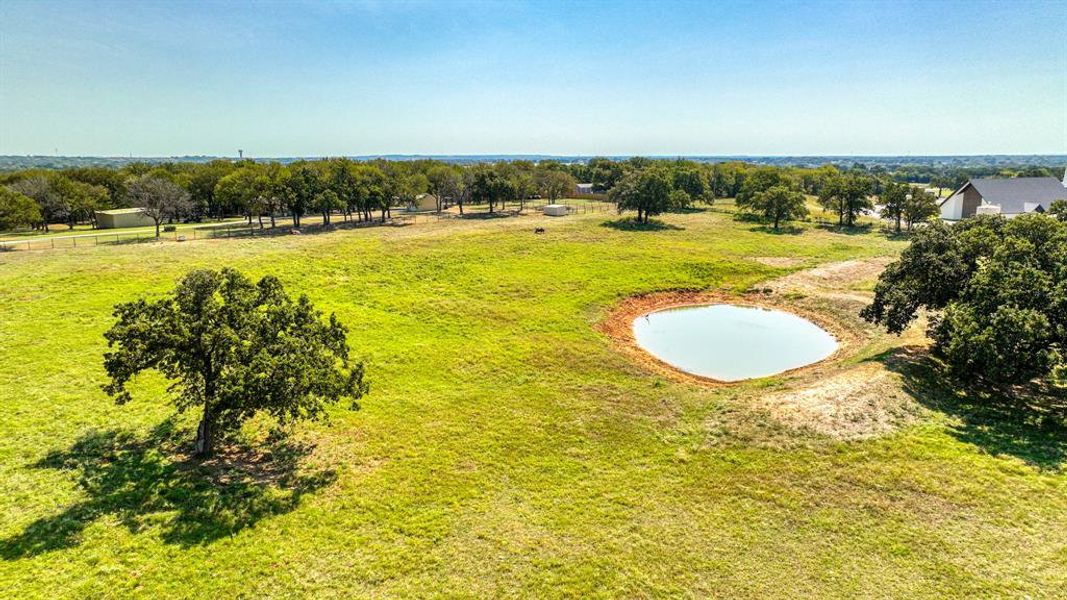 Birds eye view of property featuring a rural view