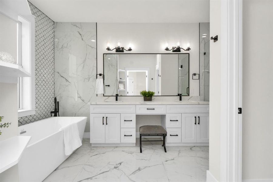 Primary bathroom: Double sink vanity, perfect makeup space, luxury and functionality.