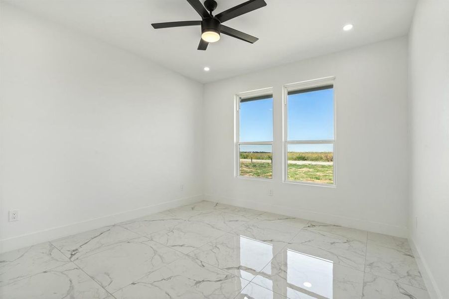 Unfurnished room with ceiling fan