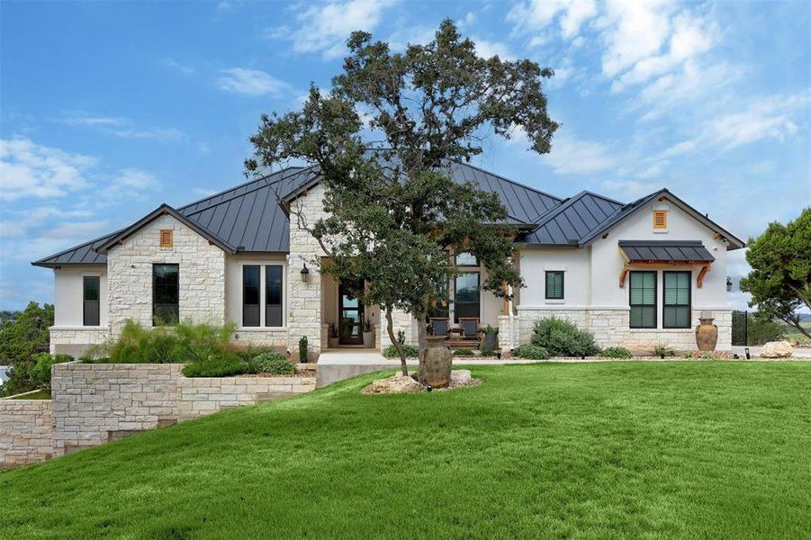 Welcome home to this custom built masterpiece in the gated community of Waterford on Lake Travis!