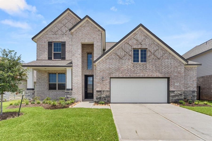 Welcome home to 27302 Blue Sand Drive located in the master planned community of Sunterra and zoned to Katy ISD.