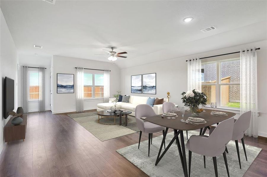 Dining area featuring dark hardwood / wood-style floors and ceiling fan