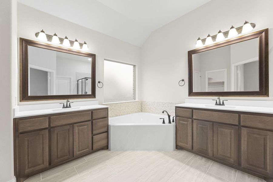 Primary Bathroom | Concept 2370 at Villages of Walnut Grove in Midlothian, TX by Landsea Homes