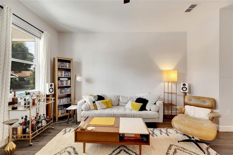 Family room.  Insuralted windows and motorized remote control blinds