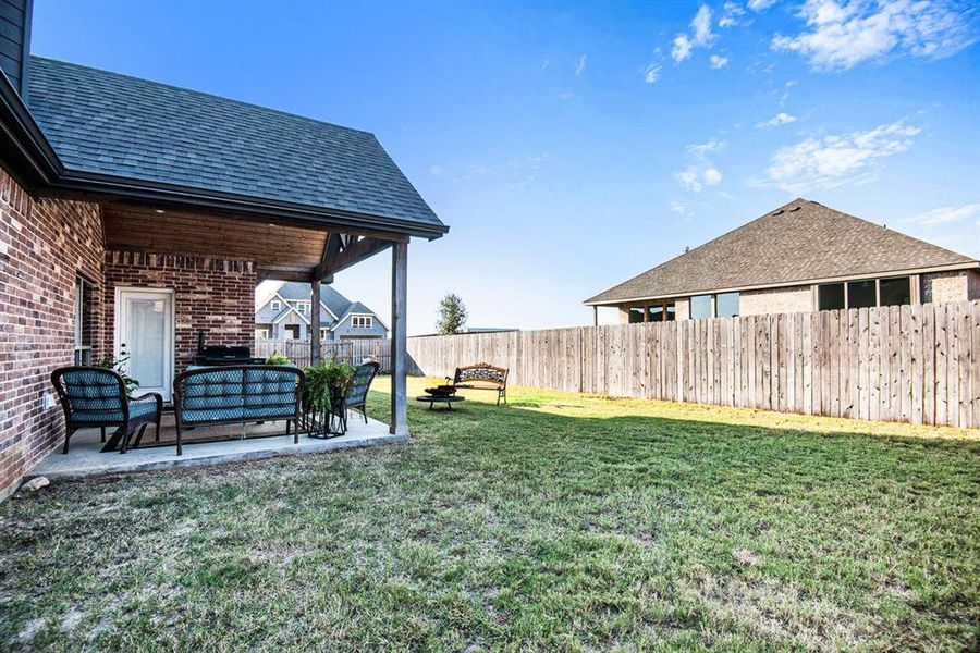 View of yard featuring outdoor lounge area and a patio