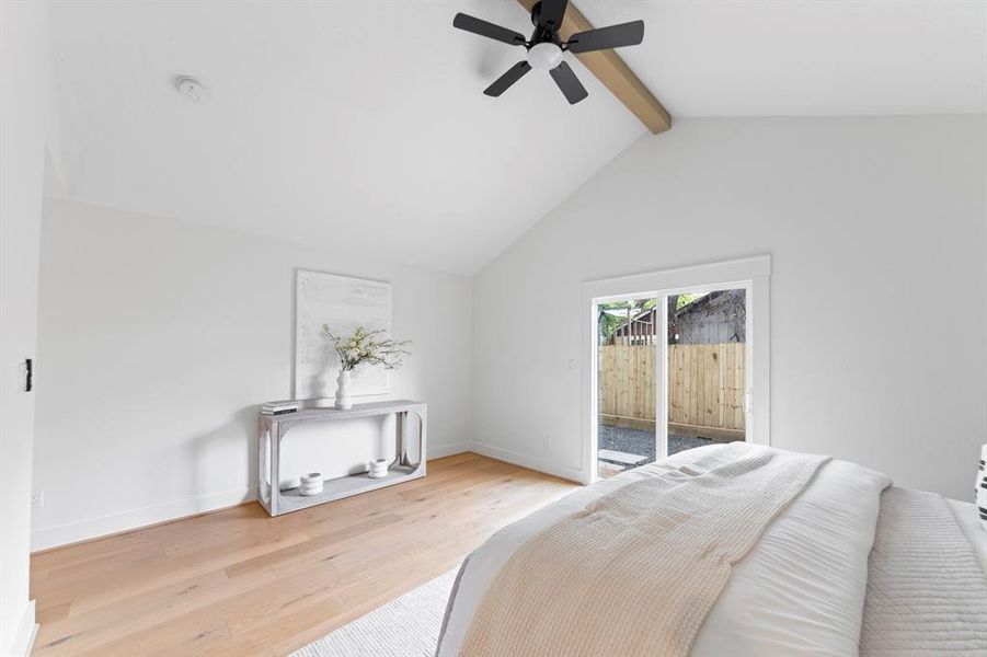 This part of the home was added during the 2024 addition. The cathedral ceiling and accent white oak beam make this the ideal sleeping oasis.