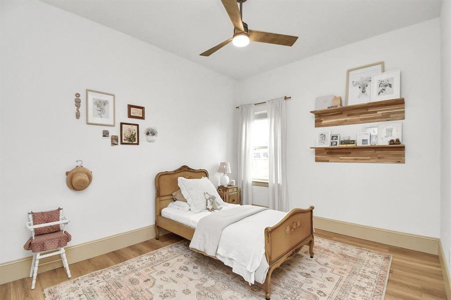 Bedroom 2 with French door closet, adjoins the Jack and Jill full bathroom.