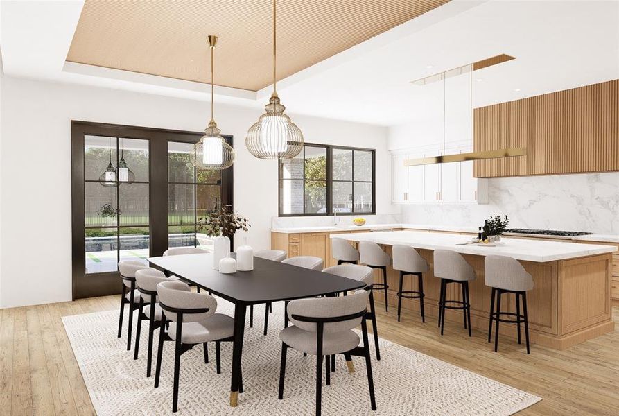 The gourmet kitchen and adjacent dining with drop paneled ceiling treatment. KitchenAid stainless steel appliances plus access to chef's pantry. Photo rendering of kitchen & dining.