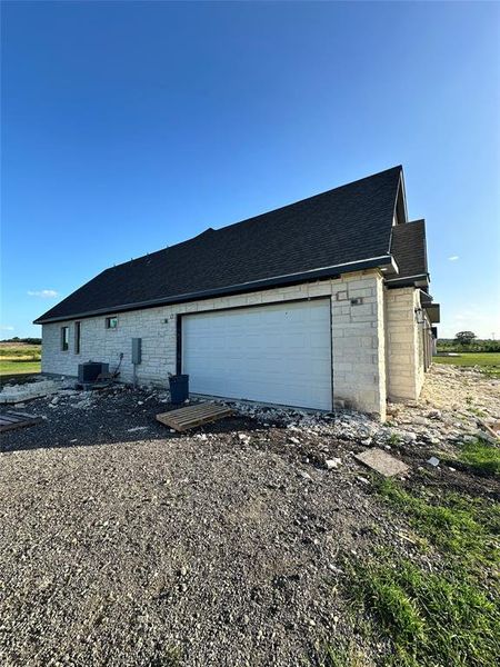 Garage on the side of the house.