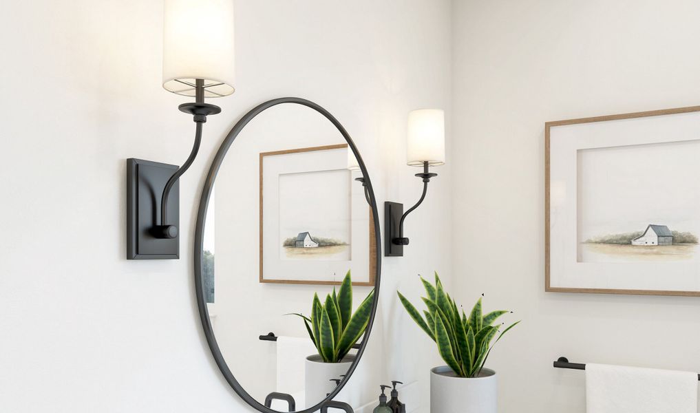 Primary bath circular mirrors and sconces with linen shades