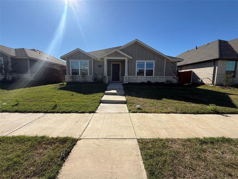 View of front of house featuring a front lawn