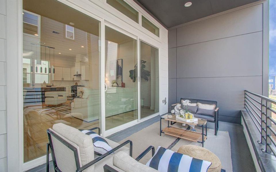 The balcony features a 12-ft sliding door, gas bib, water bill, outdoor TV connection, and ceiling fan connection