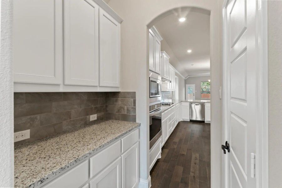 Kitchen | Concept 2533 at Abe's Landing in Granbury, TX by Landsea Homes