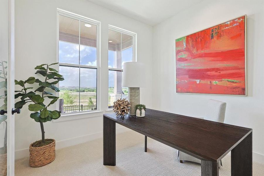 View of carpeted home office