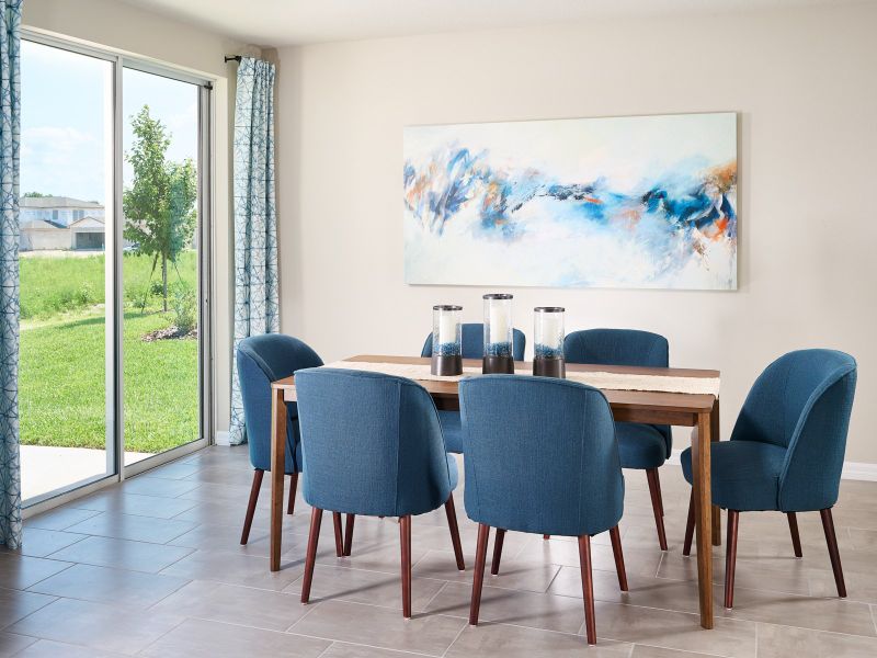 Dining area of the Foxglove plan modeled at The Reserve at Van Oaks.