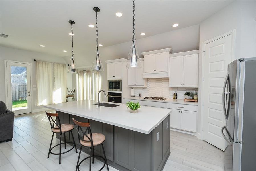 Chic Breakfast Bar with Pendant Lighting