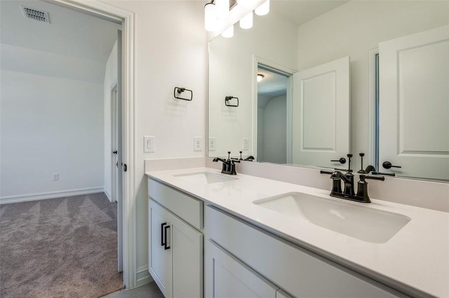 Bathroom featuring vanity