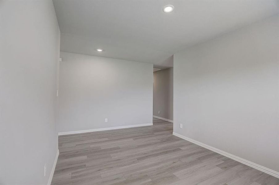 Spare room with light hardwood / wood-style floors