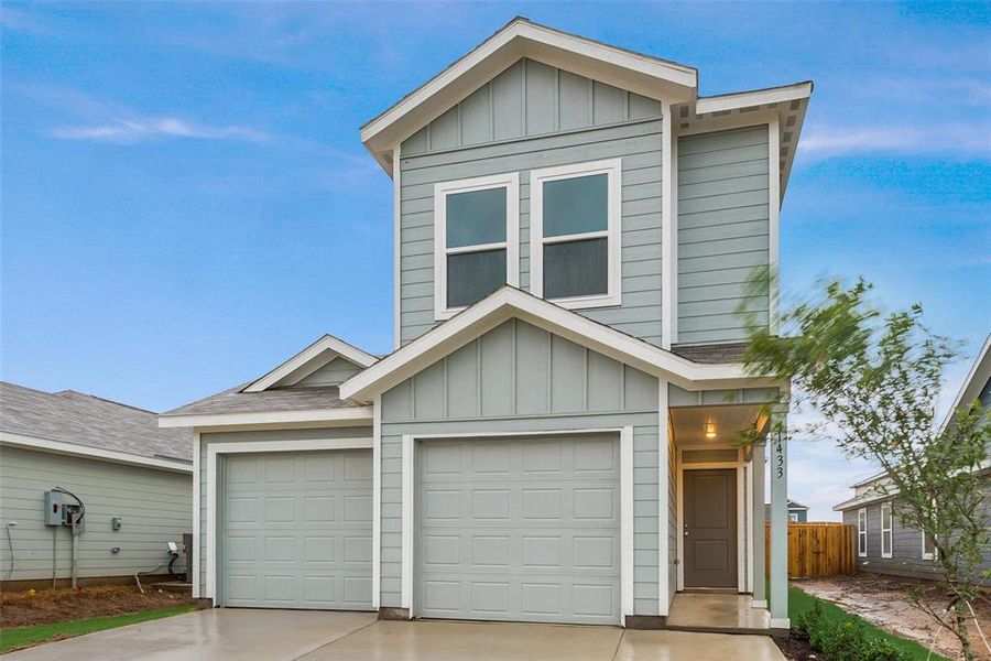 View of front of house with a garage