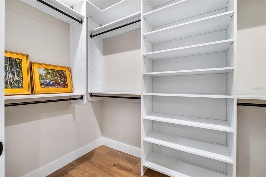 Every closet in this home is fit with custom finishes.