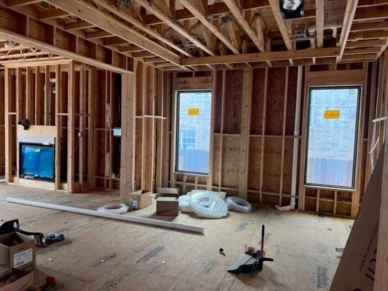 Large dining area opens to living area and front foyer. Progress photo taken 4.18.24.