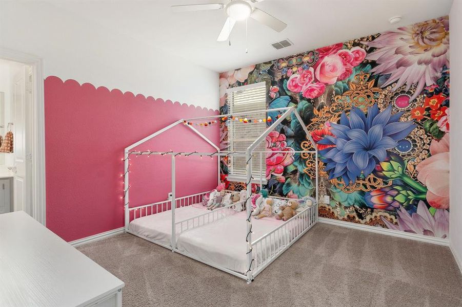 Bedroom with carpet floors and ceiling fan