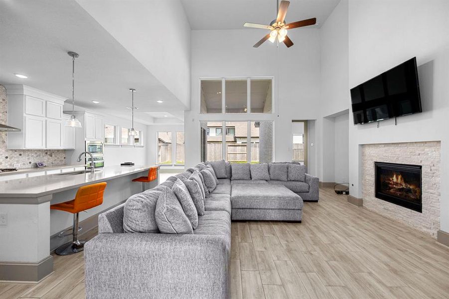 The open floor plan connects the living room, kitchen, and informal dining room.  Perfect for family gatherings or entertaining.