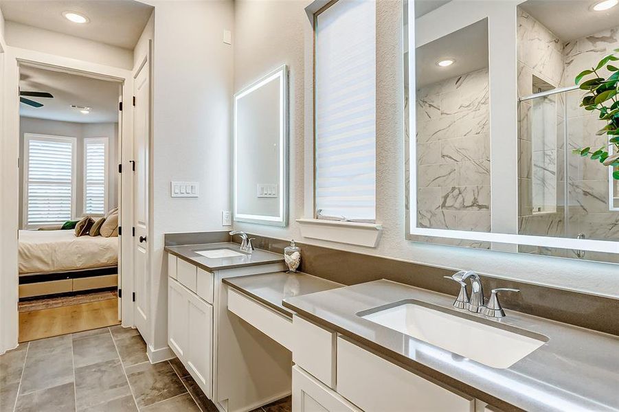 double sinks and his and her vanities offer plenty of storage for all of your grooming supplies.