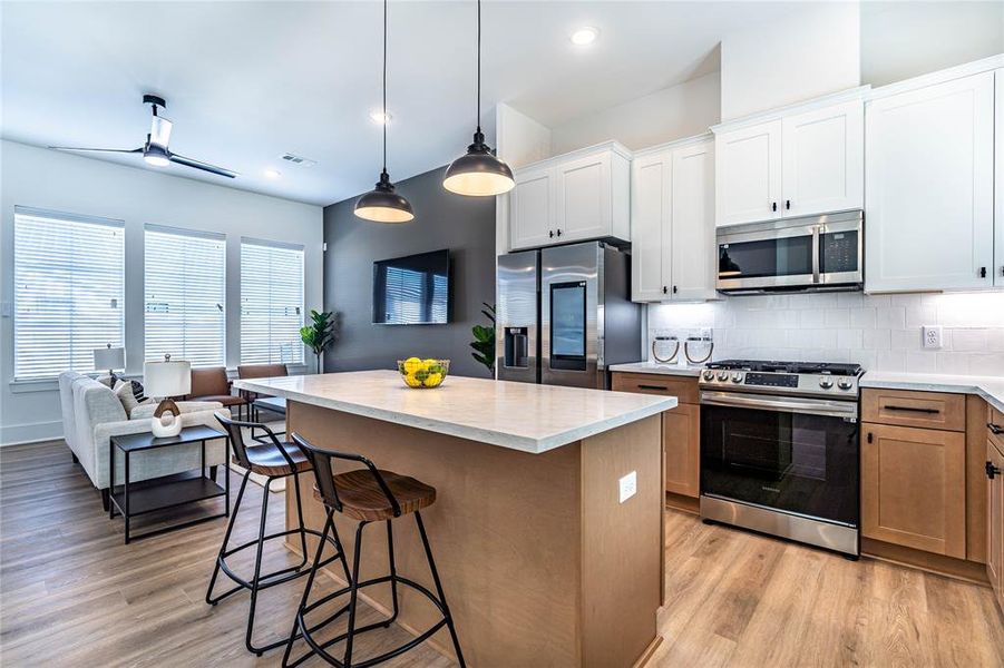 View of the kitchen island and the livingroom