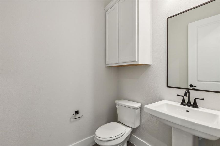 Bathroom with toilet and sink