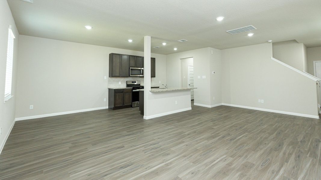 Family Room to Kitchen and Dining Area