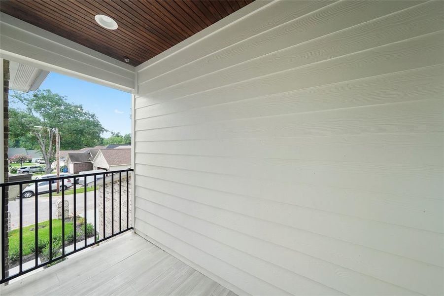 Private second floor balcony off of the primary bedroom.