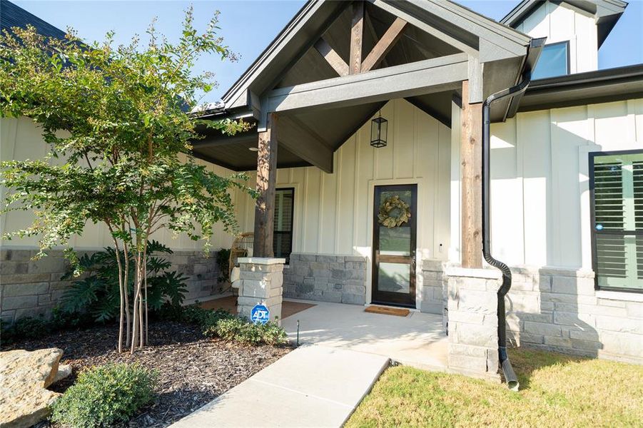 Property entrance with a porch