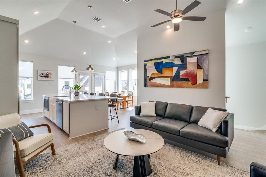 Another view of the spacious open concept living area.  In this picture the stair landing is to the right and the dining area is in the background.