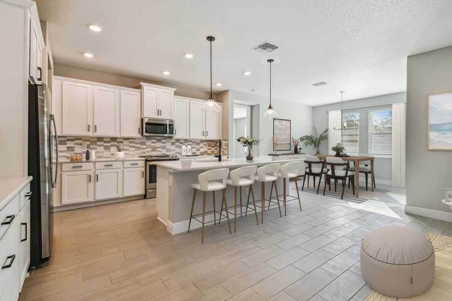 Captiva new construction home plan interior kitchen and cafe dining by William Ryan Homes Tampa