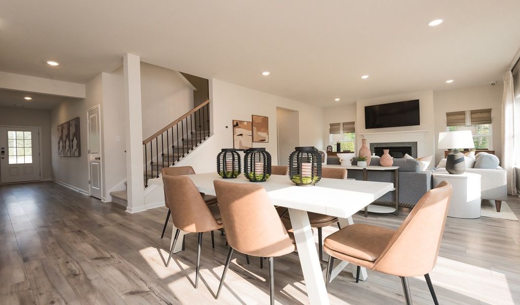 Gather the whole family around the dining table, at the heart of the open-concept living area.