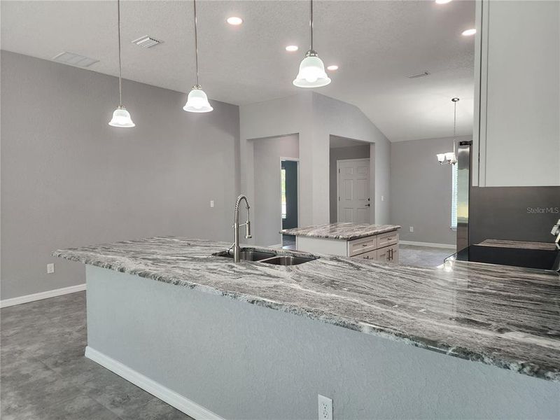 Kitchen with recess lighting and pendant lighting