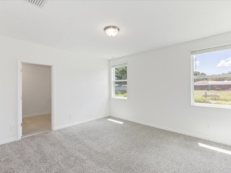 Primary bedroom in the Daphne floorplan at 5170 Minneola Lane