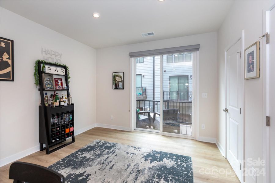 Spacious dining area leads out to the second floor deck/balcony.