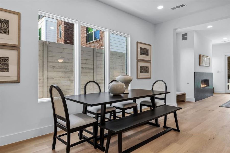 Dining space featuring light hardwood / wood-style floors