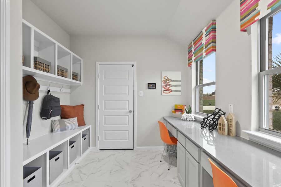 Home Management Center and Backpack Rack in the Heisman home plan by Trophy Signature Homes – REPRESENTATIVE PHOTO