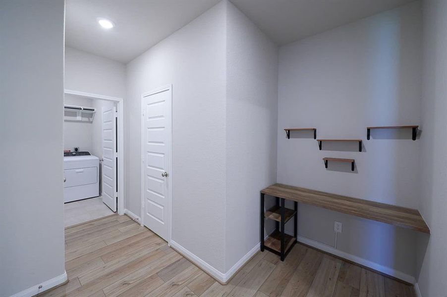 Mudroom with office or study nook.