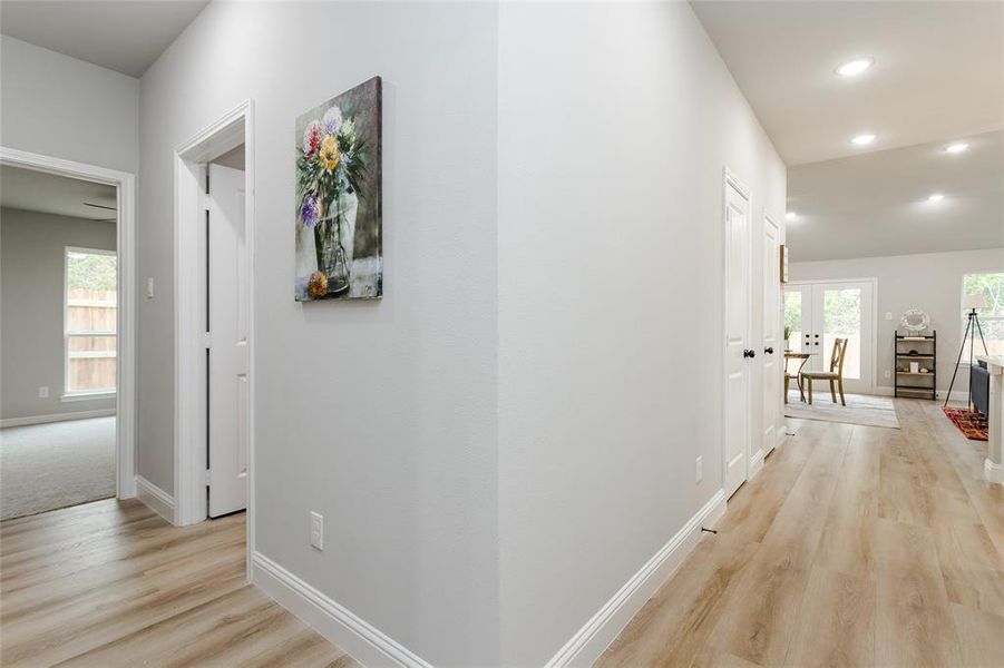 Corridor featuring light hardwood / wood-style floors